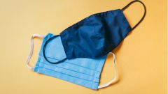 В США призвали носить две маски одновременно для лучшей защиты